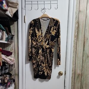 Elegant Black and Gold Patterned Dress